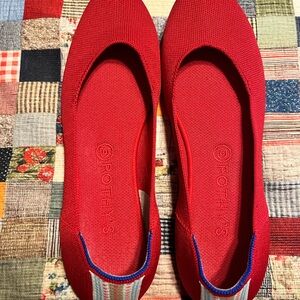Rothy's Vibrant Red Flats with embroidered detail